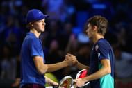Jannik Sinner (L) and Alex de Minaur